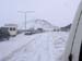 border of Sweden and Norway. Cars waiting in the snowstorm for a permission to drive