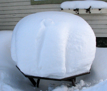 25th february garden table covered with snow